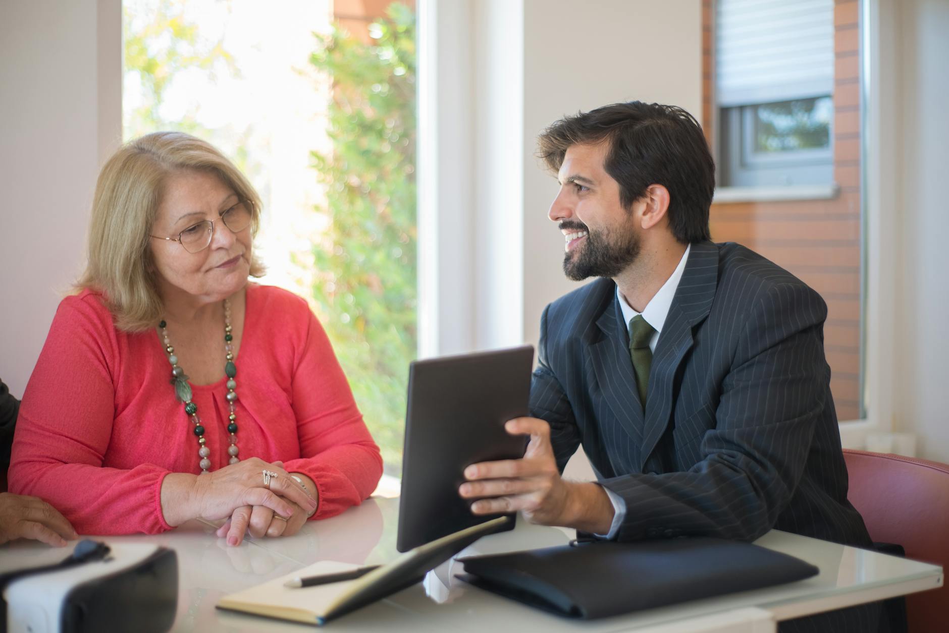Investment advisory professionals in a modern meeting